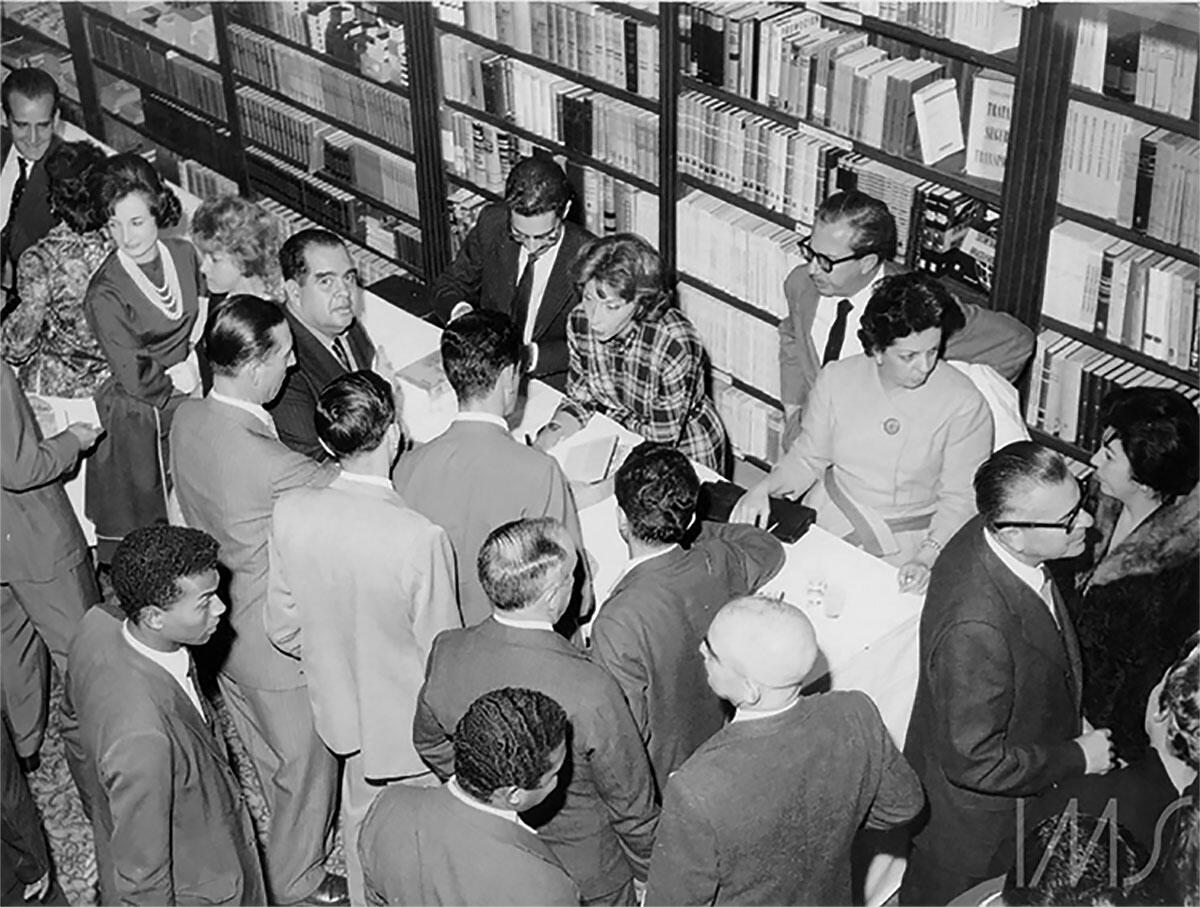 A crowd waits during the first wave of “Lispectormania” – Clarice signing books in Rio de Janeiro in the 1960s. (Photo courtesy of the Instituto Moreira Salles.)
