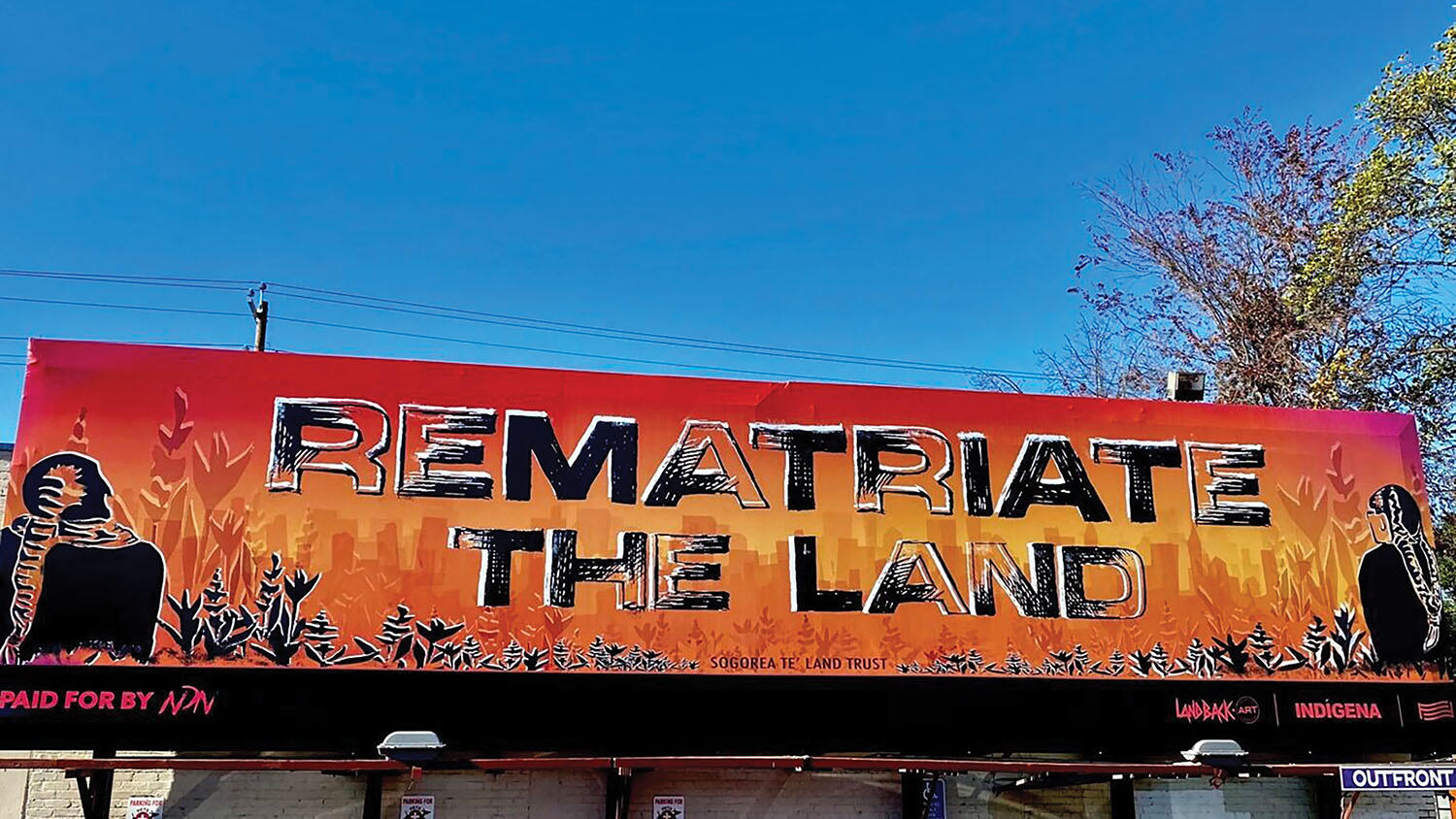 A billboard in Berkeley, California, calls for the city to “rematriate the (Ohlone) land.” (Photo courtesy of the Sogorea Te’ Land Trust.)
