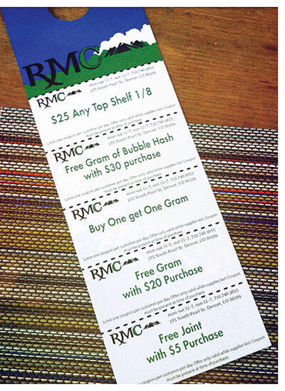 A door hanger with coupons for the purchase of marijuana in Denver, Colorado. (Photo by Owen Lin.)